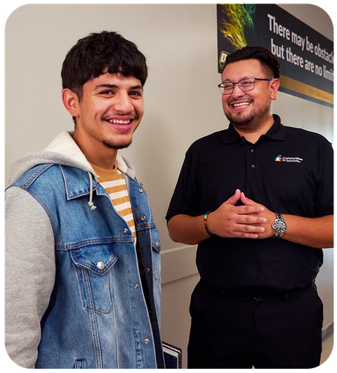 Two men smiling