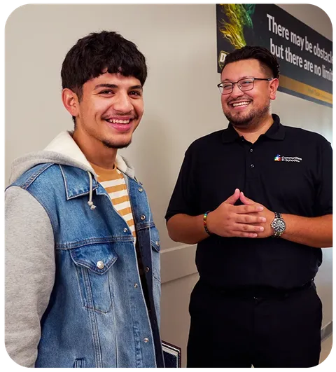 Two men smiling