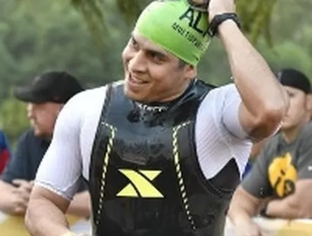 Rey Saldaña, CIS National President and CEO, competing in Ironman