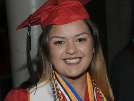 CIS alumna Leanna in her cap and gown