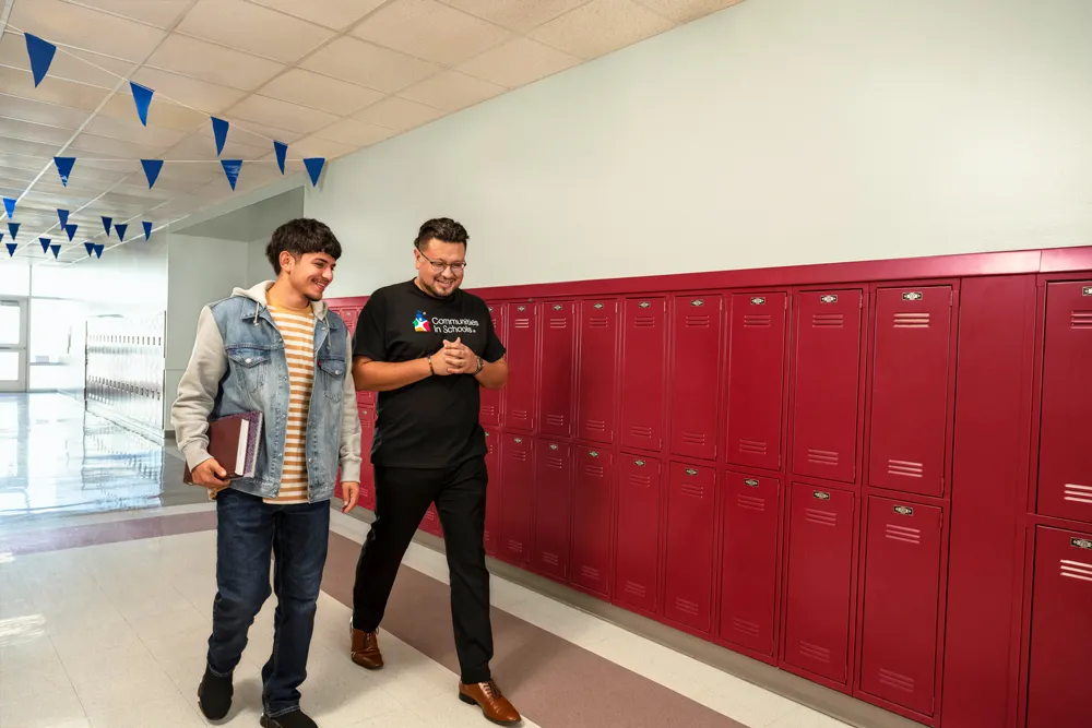 CIS Site Coordinator Marco and Alumnus Esteban