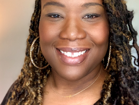 A headshot of our program manager of learning and practice, Jenelle Williams