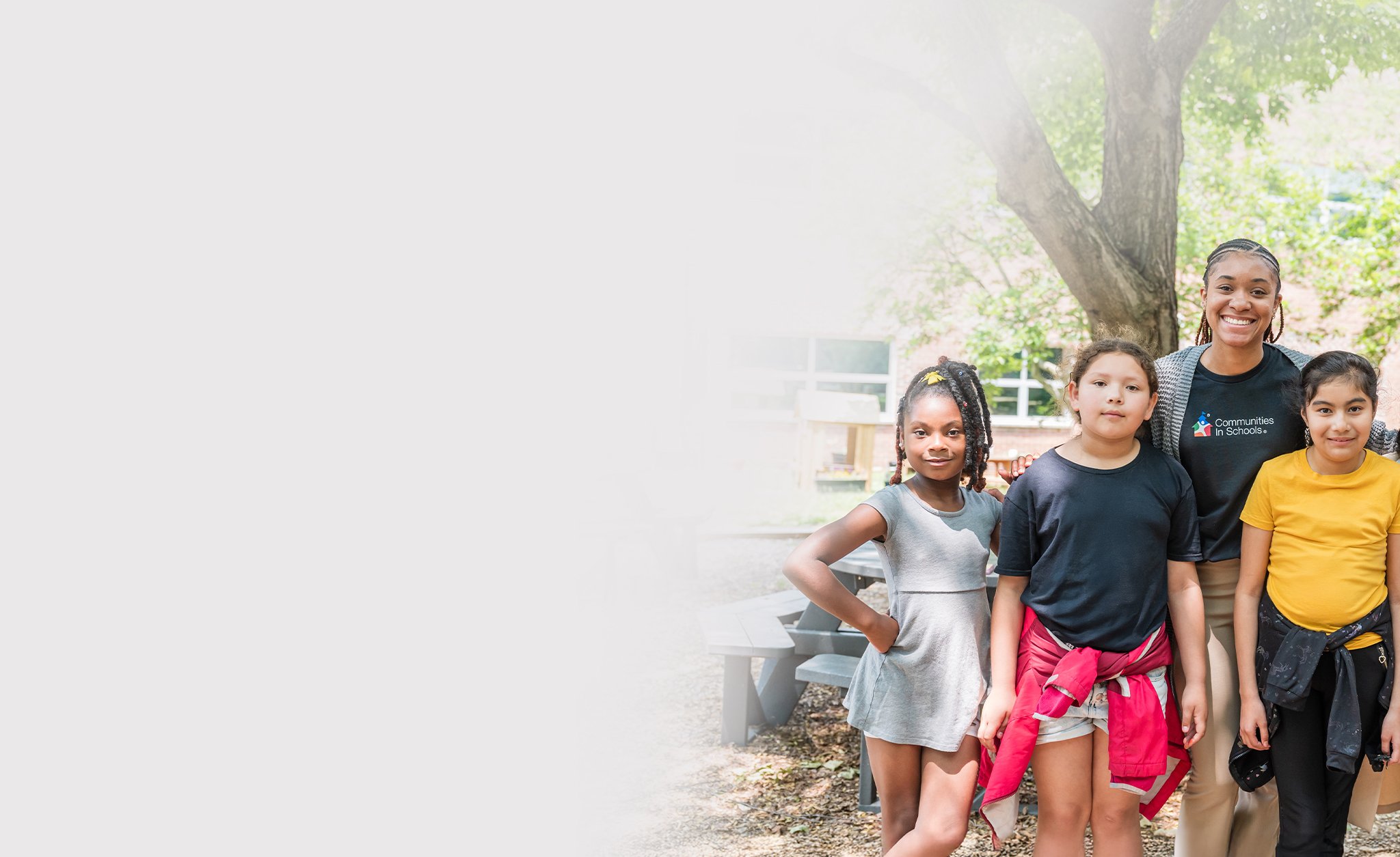 Student with globe and stack of books